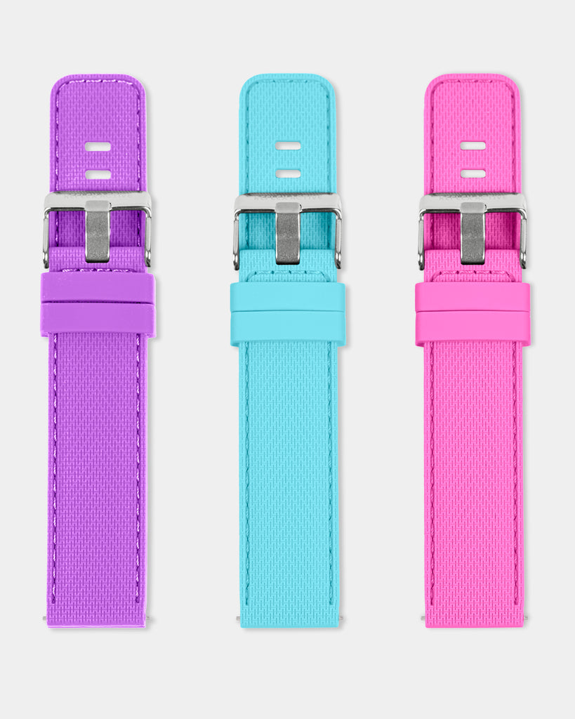 Three vibrant Reflex-Active silicone watch straps on a white background.