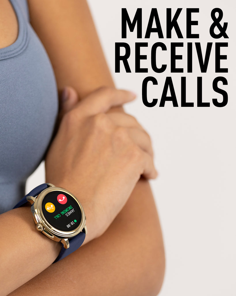 A woman wearing a sleek Reflex-Active Series 25 Navy Gold Calling Smart Watch with the ability to make and receive calls.